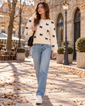 Celine Women's Short Crewneck Knit Sweater Featuring Bow Print and Ribbed Trim