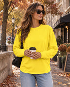 Top oversize da donna Petra – camicia casual a vestibilità comoda, in tessuto morbido ed elasticizzato, con scollo rotondo e maniche lunghe