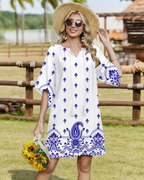 Robe tunique bohème pour femme Cecilia – Robe fleurie à pompons, col en V, longueur genou et poches